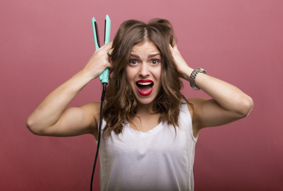 7x tips waardoor de stijltang je haar niet beschadigt